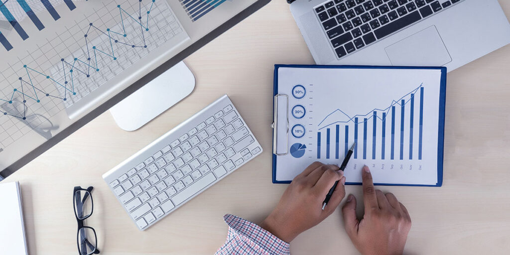 man working with data on desk